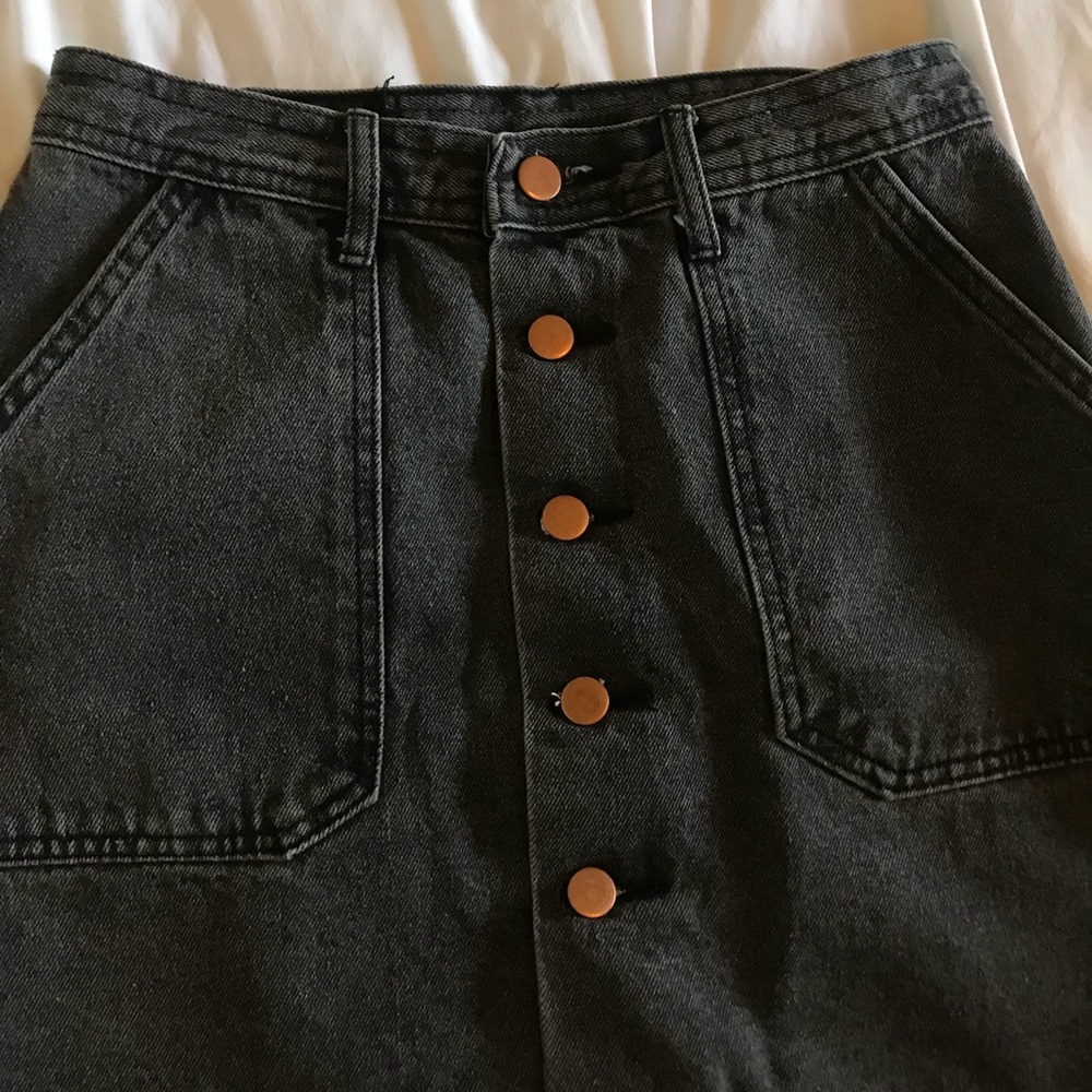 black denim button up skirt with pockets